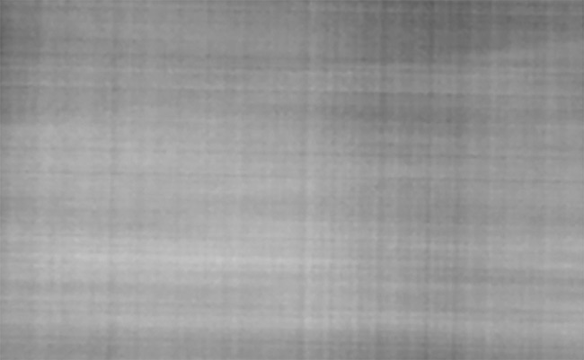 Figure 2. An OLED display with line mura defects (top). Courtesy of Radiant Vision Systems.
