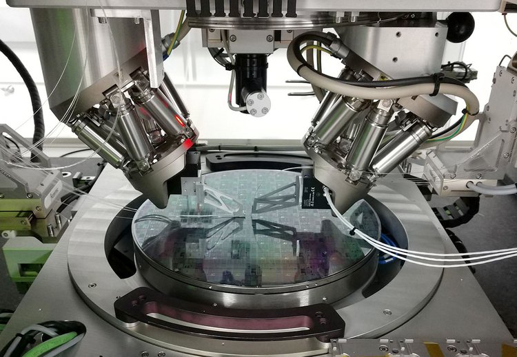 The large automated prober in AIM Photonics’ test lab enables programmable optical, DC and RF interrogation of wafer substrates as large as 300 mm, with additional flexibility for die-level testing. Courtesy of AIM Photonics.