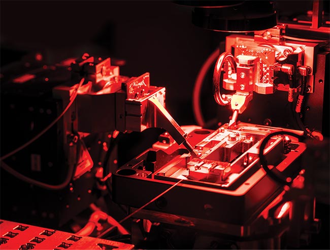 The future of quantum components will see increasing integration and automated manufacturing. Here, an entangled photon pair source is manufactured at Quantum Optics Jena. Courtesy of Quantum Optics Jena.