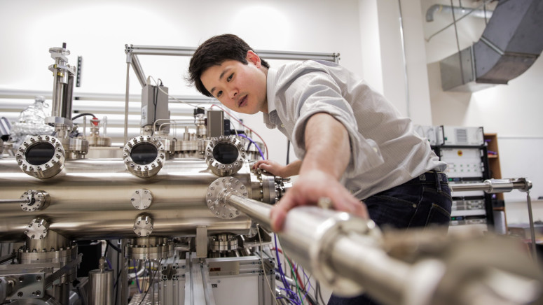 Associate Professor Jason Kawasaki is co-lead of a MRSEC research thrust investigating magnetic states in strained membranes, which could lead to new types of ultrafast data transmission and storage. Courtesy of Steph Precourt, UW-Madison. 
