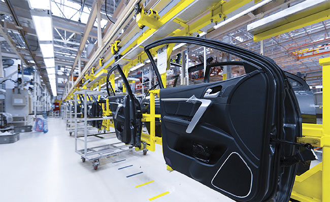 Preparation of doors for installation in a car factory. Courtesy of Stock.com/Traimak_Ivan.