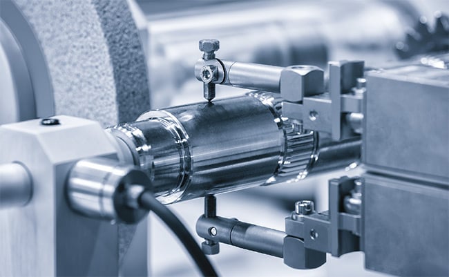  A CNC (computer numerical control) milling machine performs a machining process similar to drilling and cutting parts with precision to accommodate exact sizes and shapes of different materials. Machine vision, assisted by AI, performs quality control to ensure that there are no anomalies. Courtesy of Matveev Aleksandr/Shutterstock.