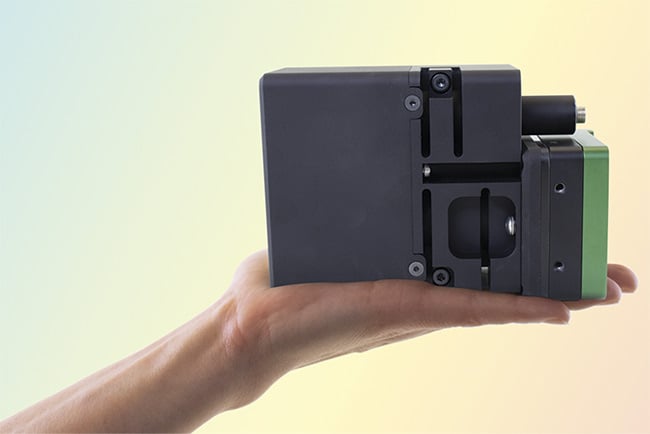 Figure 6. Today’s compact OCT spectrometers are small enough to fit in the palm of a hand, making them suitable for size-constrained applications in the clinic or operating theater. Courtesy of Wasatch Photonics.