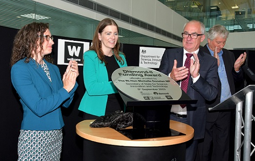 The £519.4M funding for Diamond-II was commemorated as a plaque. Left to right: Beth Thompson MBE Chief Strategy Officer at Wellcome, Secretary of State for Science, Innovation and Technology; the Rt Hon Michelle Donelan MP; Executive Chair of STFC Professor Mark Thomson; and Sir Adrian Smith, Chair of the Board of Diamond. Courtesy of Diamond Light Source.