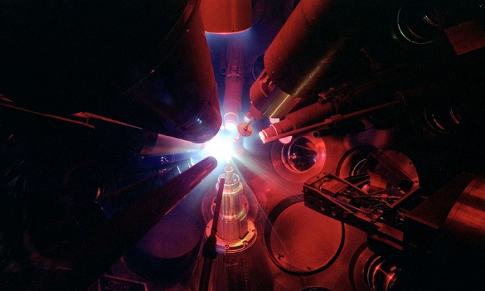 Inside the OMEGA target chamber during an experiment. Courtesy of the University of Rochester.