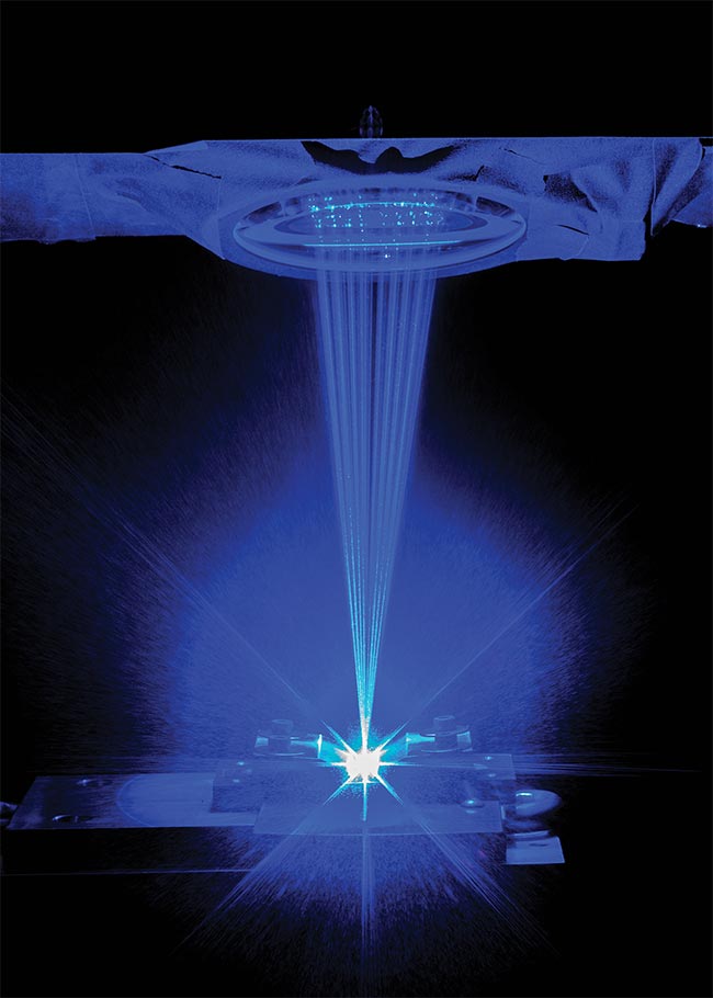A blue laser welding copper sheets. Green and blue lasers are often more ideal for the welding of highly reflective metals, such as copper and aluminum, offering lower heat input and improved process stability >1 µm. Courtesy of NUBURU.