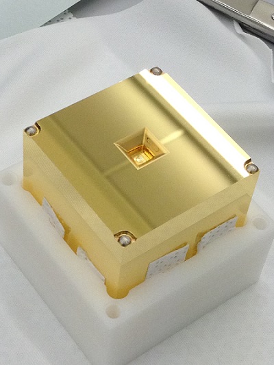 The three spacecraft of the LISA mission will each host two of these gold-platinum cube test masses. They are free-floating and contained within an electrode housing. Gravitational waves can be discovered when the distances between the cubes in different spacecraft changes. LISA will track these changes by exchanging laser beams between adjacent pairs of spacecraft. Courtesy of ESA.