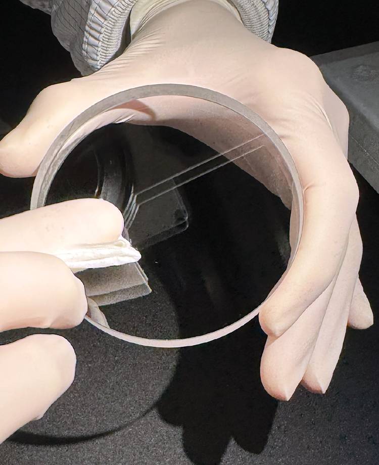 There are four primary hand-cleaning techniques: the drop-and-drag method, the brush technique, the wipe method, and immersion cleaning. No matter which method is used, it is best to first clean the edges of the component to avoid drawing debris onto polished surfaces. Courtesy of Perkins Precision Developments.