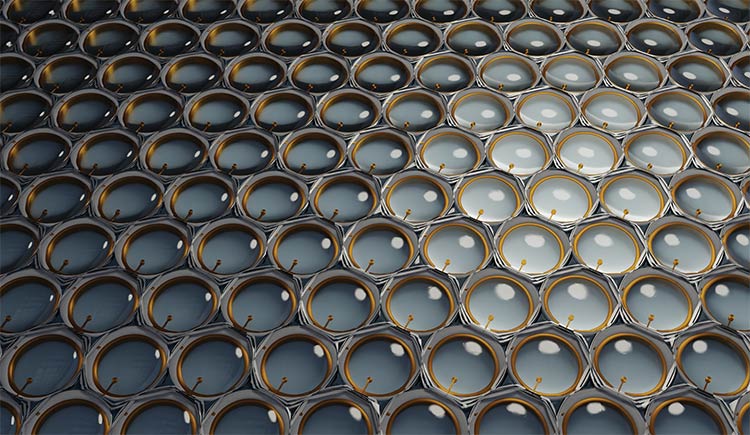 A close-up of a single-photon avalanche diode (SPAD) array with a microlens. Courtesy of Pi Imaging.