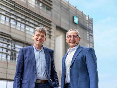 Volker Herbig, vice president for microsystems at X-FAB, and professor Harald Kuhn from Fraunhofer in front of the Fraunhofer Institute in Chemnitz. Courtesy of X-FAB.