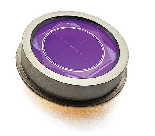 Figure 2. A black silicon four-quadrant detector chip (top) and a packaged component optimized for 1064 nm. In addition to defense applications, black silicon-based four-quadrant detectors are beneficial for other applications for which precise laser beam tracking or alignment is needed. The technology holds promise for medical imaging technologies and industrial process control. Black silicon nanostructures could also enable new capabilities in scientific instrumentation and analytical devices operating in the NIR. Courtesy of ElFys.