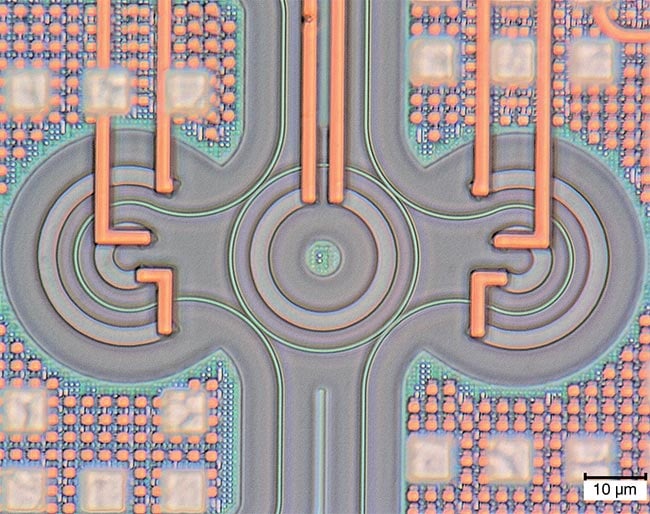 Advancements in single-photon sources have further established this enabling technology for quantum integrated photonics systems. This single-photon source shows silicon waveguides, heaters, and copper wiring. Courtesy of AIM Photonics.