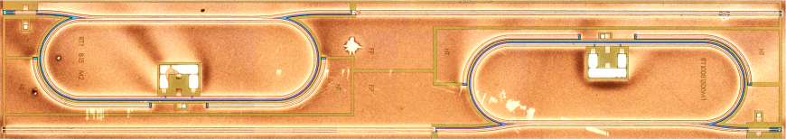 The quantum cascade photonic integrated chip contains two devices comprising of four components each, including a Fabry-Perot drive laser, a waveguide coupler, a resistive heater, and a racetrack resonator. Courtesy of Harvard.