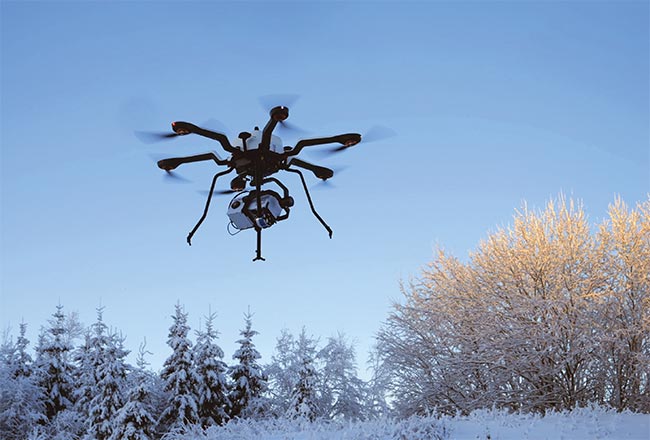 A HySpex Mjolnir VS-620 navigation system with lidar, flying on an Acecore NOA6 UAV equipped with a tilted AEVO Gremsy gimbal, looking into the tree line. Courtesy of HySpex by NEO.