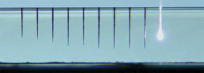 A side view of optimized percussion drilling with 250-fs pulses provides high-aspect-ratio holes of up to 800 µm in 1.1-mm-thick borosilicate glass. The number of pulses/hole is 2000, with a pulse repetition rate between 2 and 36 KHz. Courtesy of Fluence.technology.