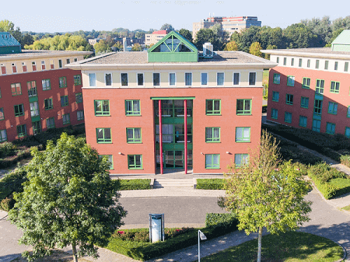 The façade of PHOTONICS INDUSTRIES EUROPE, BV in Zevenaar, Netherlands. Courtesy of Photonics Industries International Inc.