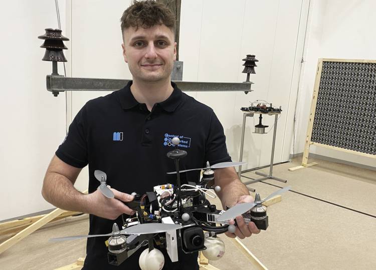 Thomas Jantos with an inspection drone. Courtesy of aau/Müller.