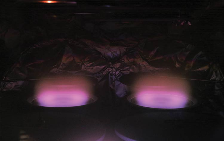 A plasma-assisted reactive magnetron sputtering (PARMS) system (above) featuring an automatic load-lock mechanism (right). Courtesy of Intlvac Thin Film.