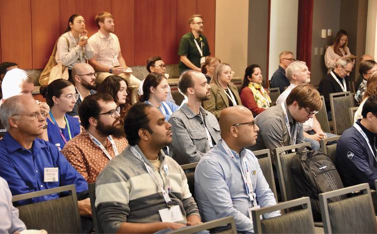 Conference attendees listen during one of the many sessions at SCIX. Courtesy of Glen Jackson/FACSS.
